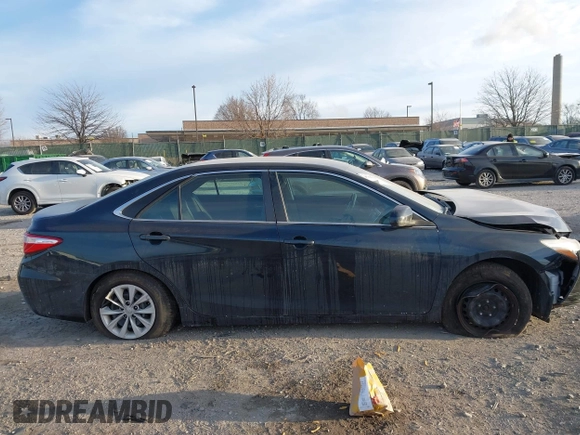 2016 Toyota Camry XLE with VIN 4T1BF1FK1GU509261, listed as a IAAI auction lot 41296127 with 159,300 mi miles and . Bid and sale history available at DreamBid. Image 12.