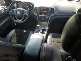 2018 Jeep Grand Cherokee Laredo E with VIN 1C4RJFAG9JC390597, listed as a Copart auction lot 71450474 with 69,645 mi miles and Salvage title. Bid and sale history available at DreamBid. Image 8.