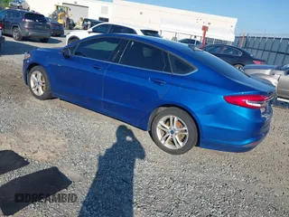 2018 Ford Fusion SE z VIN 3FA6P0H7XJR106776, wystawiony jako IAAI lot #42243361 z przebiegiem 174 000 mil mil oraz . Historia ofert i sprzedaży dostępna na DreamBid. Obrazek 3.