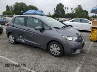 2015 Honda Fit LX z VIN 3HGGK5H58FM785137, wystawiony jako Copart lot #59013315 z przebiegiem 84 592 mil mil oraz Szkoda całkowita • Salvage title. Historia ofert i sprzedaży dostępna na DreamBid. Obrazek 4.