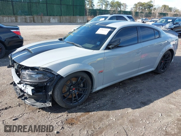 2022 Dodge Charger Scat Pack Widebody with VIN 2C3CDXGJ6NH176650, listed as a IAAI auction lot 41863122 with 34,569 mi miles and . Bid and sale history available at DreamBid. Image 2.
