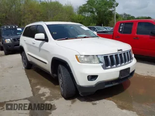 2012 Jeep Grand Cherokee Laredo with VIN 1C4RJFAG8CC124877, listed as a IAAI auction lot 41940603 with 254,356 mi miles. Bid and sale history available at carsss.com. Image 1.