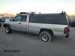 2000 Dodge Ram 2500 with VIN 1B7KF2369YJ144753, listed as a Copart auction lot 80801414 with 173,413 mi miles and Salvage Title. Bid and sale history available at carsss.com. Image 2.