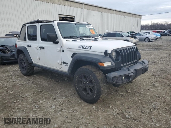 2022 Jeep Wrangler Unlimited Sport with VIN 1C4HJXDG8NW139975, listed as a Copart auction lot 43939515 with 59,812 mi miles and Salvage Title. Bid and sale history available at DreamBid. Image 4.