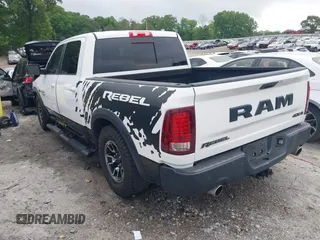 2017 Ram 1500 Rebel with VIN 1C6RR7YT7HS575529, listed as a IAAI auction lot 42125529 with 110,722 mi miles and . Bid and sale history available at DreamBid. Image 3.