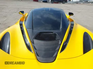 2019 McLaren 720S z VIN SBM14DCAXKW002639, wystawiony jako IAAI lot #41707749 z przebiegiem 59 720 mil mil oraz . Historia ofert i sprzedaży dostępna na DreamBid. Obrazek 10.
