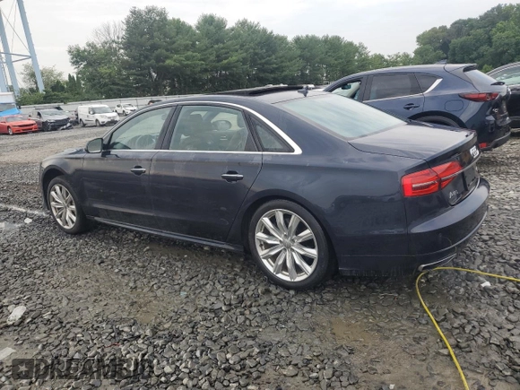 2018 Audi A8 with VIN WAU44AFD0JN000152, listed as a Copart auction lot 62844254 with 47,325 mi miles and Salvage title. Bid and sale history available at DreamBid. Image 2.