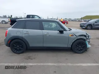 2015 MINI Hardtop 4 Door with VIN WMWXS5C52FT829699, listed as a IAAI auction lot 42078187 with 59,641 mi miles and . Bid and sale history available at DreamBid. Image 14.