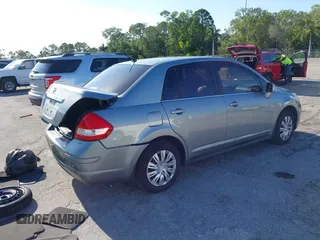 2009 Nissan Versa 1.8 S with VIN 3N1BC11E09L377706, listed as a IAAI auction lot 42027981 with 146,105 mi miles. Bid and sale history available at carsss.com. Image 4.
