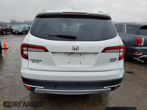 2021 Honda Pilot Touring 7-Passenger z VIN 5FNYF6H66MB023058, wystawiony jako Copart lot #41211023 z przebiegiem 45 255 mil mil oraz Szkoda całkowita • Salvage title. Historia ofert i sprzedaży dostępna na DreamBid. Obrazek 6.