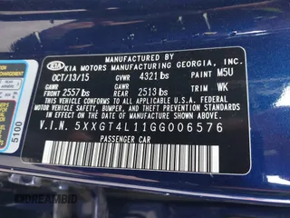 2016 Kia Optima LX Turbo with VIN 5XXGT4L11GG006576, listed as a IAAI auction lot 41666504 with 87,257 mi miles. Bid and sale history available at carsss.com. Image 9.