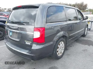 2015 Chrysler Town & Country Touring with VIN 2C4RC1BGXFR655330, listed as a IAAI auction lot 42181430 with 148,195 mi miles and . Bid and sale history available at DreamBid. Image 4.