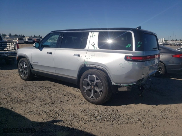 2024 Rivian R1S Adventure with VIN 7PDSGBBA5RN044560, listed as a Copart auction lot 70594924 with 2,449 mi miles and Salvage Title. Bid and sale history available at carsss.com. Image 2.