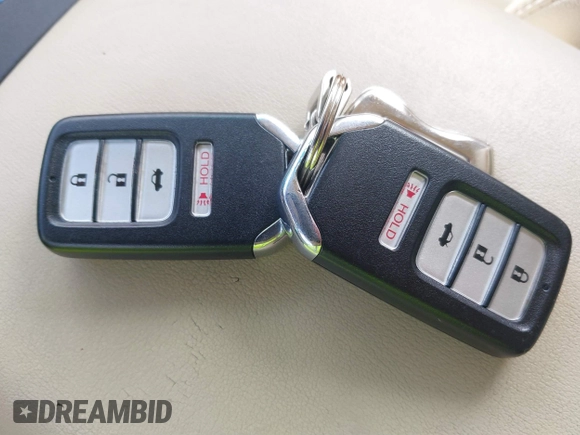 2020 Honda Civic Si with VIN 2HGFC1E50LH702493, listed as a IAAI auction lot 40609245 with 62,660 mi miles and . Bid and sale history available at DreamBid. Image 11.