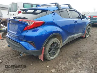2020 Toyota C-HR LE with VIN JTNKHMBX6L1074648, listed as a IAAI auction lot 41528945 with 108,333 mi miles. Bid and sale history available at carsss.com. Image 4.