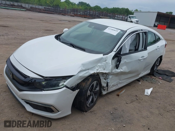 2020 Honda Civic LX z VIN 19XFC2F66LE021813, wystawiony jako IAAI lot #42285033 z przebiegiem 116 069 mil mil oraz . Historia ofert i sprzedaży dostępna na DreamBid. Obrazek 2.