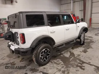 2021 Ford Bronco with VIN 1FMEE5DP6MLA71957, listed as a IAAI auction lot 41587072 with 42,896 mi miles and . Bid and sale history available at DreamBid. Image 4.