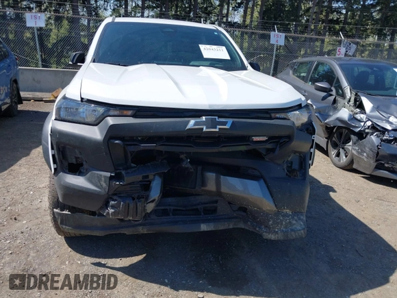 2023 Chevrolet Colorado 4WD Trail Boss with VIN 1GCPTEEK2P1203392, listed as a IAAI auction lot 42043211 with 27,589 mi miles. Bid and sale history available at carsss.com. Image 6.