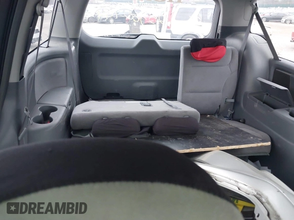 2005 Honda Odyssey EX with VIN 5FNRL38435B071998, listed as a IAAI auction lot 41808601 with 999,999 mi miles. Bid and sale history available at carsss.com. Image 8.
