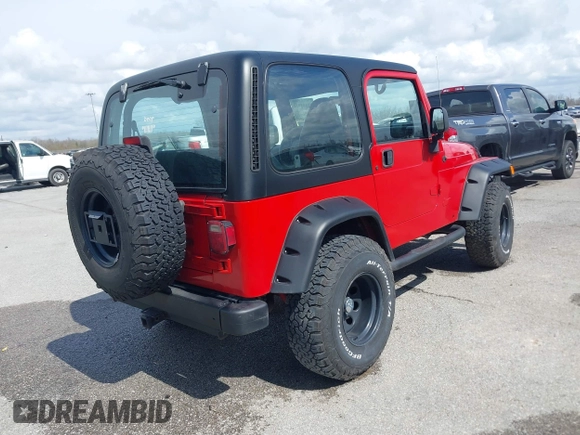 2002 Jeep Wrangler X with VIN 1J4FA39S02P739211, listed as a IAAI auction lot 41665910 with 144,118 mi miles. Bid and sale history available at carsss.com. Image 4.