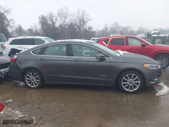 2017 Ford Fusion Energi SE with VIN 3FA6P0PU6HR203037, listed as a IAAI auction lot 41567334 with 96,852 mi miles. Bid and sale history available at carsss.com. Image 13.