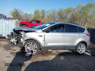2013 Ford Escape SEL with VIN 1FMCU0HX4DUB98238, listed as a IAAI auction lot 41973221 with 131,590 mi miles and . Bid and sale history available at DreamBid. Image 15.