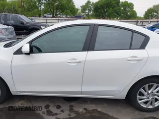 2012 Mazda Mazda3 i Touring with VIN JM1BL1V74C1694444, listed as a IAAI auction lot 41879335 with 123,020 mi miles. Bid and sale history available at carsss.com. Image 14.