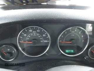 2014 Jeep Wrangler Sport with VIN 1C4AJWAG5EL285994, listed as a IAAI auction lot 41558673 with 98,779 mi miles and . Bid and sale history available at DreamBid. Image 7.