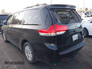 2013 Toyota Sienna XLE AAS with VIN 5TDYK3DC2DS292627, listed as a IAAI auction lot 41953059 with 186,007 mi miles and . Bid and sale history available at DreamBid. Image 3.