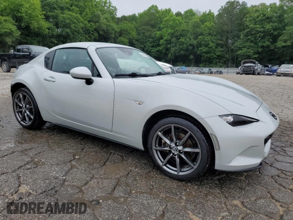 2017 Mazda MX-5 Miata Grand Touring z VIN JM1NDAM70H0104393, wystawiony jako Copart lot #58081805 z przebiegiem 76 279 mil mil oraz Szkoda całkowita • Salvage title. Historia ofert i sprzedaży dostępna na DreamBid. Obrazek 4.