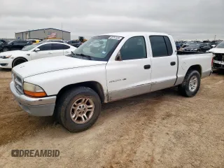 2001 Dodge Dakota Sport z VIN 1B7GL2AN51S118157, wystawiony jako Copart lot #58797325 z przebiegiem 147 765 mil mil oraz Szkoda całkowita • Salvage title. Historia ofert i sprzedaży dostępna na DreamBid. Obrazek 1.