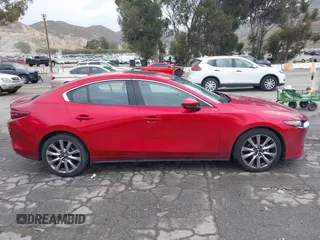 2021 Mazda 3 with VIN JM1BPBDL6M1305765, listed as a IAAI auction lot 42063684 with 61,011 mi miles and . Bid and sale history available at DreamBid. Image 13.