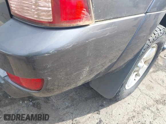 2004 Toyota 4Runner SR5 with VIN JTEBU14R140028905, listed as a IAAI auction lot 42117509 with 245,717 mi miles and . Bid and sale history available at DreamBid. Image 12.