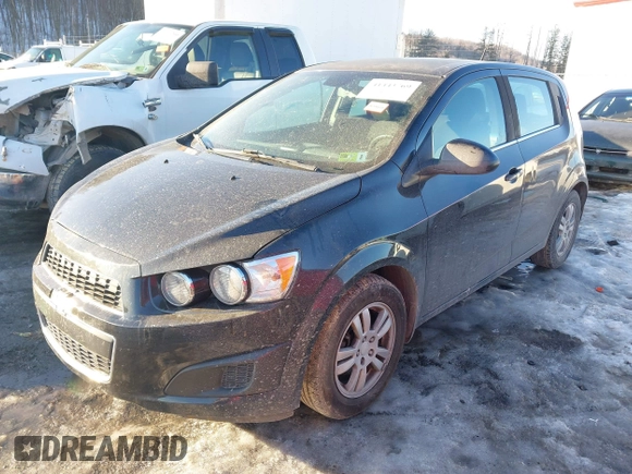 2013 Chevrolet Sonic LT with VIN 1G1JC6SB2D4256838, listed as a IAAI auction lot 41443769 with 98,839 mi miles. Bid and sale history available at carsss.com. Image 2.