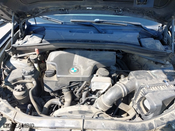 2014 BMW X1 xDrive28i with VIN WBAVL1C57EVY23722, listed as a IAAI auction lot 41839543 with 121,742 mi miles. Bid and sale history available at carsss.com. Image 10.