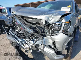 2024 GMC Sierra 1500 with VIN 1GTPHGE89RZ120273, listed as a IAAI auction lot 40288504 with 24,296 mi miles and . Bid and sale history available at DreamBid. Image 6.