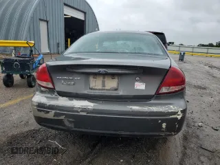2005 Ford Taurus SE z VIN 1FAFP53U35A138592, wystawiony jako Copart lot #56176905 z przebiegiem Nie podano mil oraz Szkoda całkowita • Salvage title. Historia ofert i sprzedaży dostępna na DreamBid. Obrazek 6.
