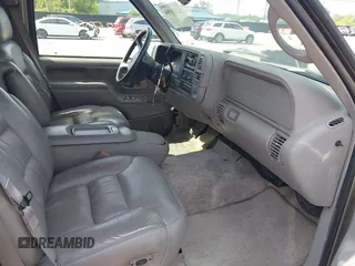 1999 GMC Suburban z VIN 3GKGK26J2XG505570, wystawiony jako IAAI lot #42358504 z przebiegiem 115 253 mil mil oraz . Historia ofert i sprzedaży dostępna na DreamBid. Obrazek 5.