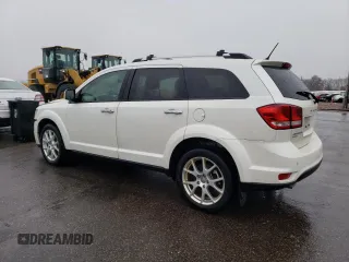 2014 Dodge Journey R/T z VIN 3C4PDDFG4ET199515, wystawiony jako Copart lot #86354504 z przebiegiem 128 888 mil mil oraz Szkoda całkowita • Salvage title. Historia ofert i sprzedaży dostępna na DreamBid. Obrazek 2.