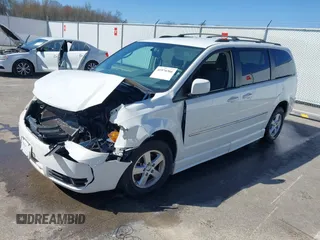 2010 Dodge Grand Caravan SXT with VIN 2D4RN5D14AR420265, listed as a IAAI auction lot 41970366 with 117,208 mi miles and . Bid and sale history available at DreamBid. Image 21.