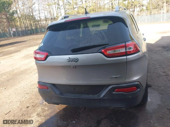 2017 Jeep Cherokee Latitude with VIN 1C4PJLCS3HW613636, listed as a IAAI auction lot 41564725 with 106,469 mi miles. Bid and sale history available at carsss.com. Image 16.