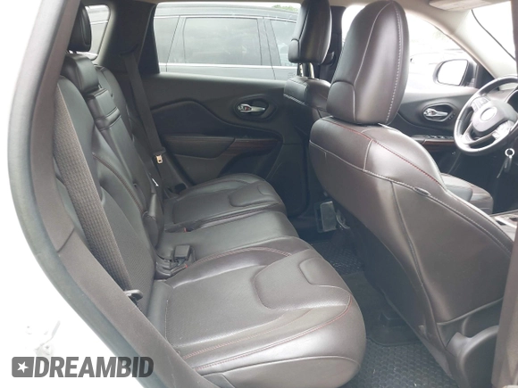 2015 Jeep Cherokee Trailhawk with VIN 1C4PJMBS9FW623740, listed as a IAAI auction lot 42131019 with 155,105 mi miles and . Bid and sale history available at DreamBid. Image 8.