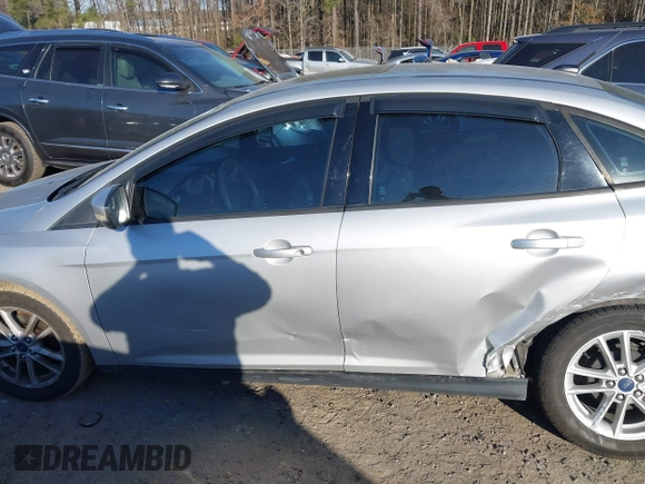 2015 Ford Focus SE with VIN 1FADP3F20FL355058, listed as a IAAI auction lot 41666337 with 144,887 mi miles. Bid and sale history available at carsss.com. Image 14.