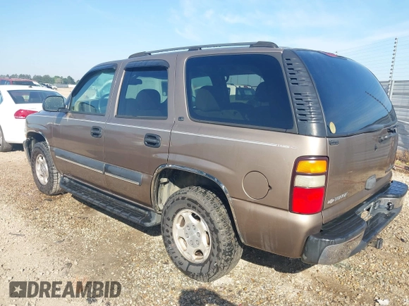 2004 Chevrolet Tahoe LT z VIN 1GNEC13Z04R130978, wystawiony jako IAAI lot #42073871 z przebiegiem 214 947 mil mil oraz . Historia ofert i sprzedaży dostępna na DreamBid. Obrazek 3.