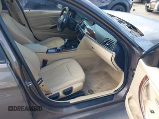 2014 BMW 3 Series 320i xDrive with VIN WBA3C3C58EF983816, listed as a IAAI auction lot 41949430 with 111,627 mi miles. Bid and sale history available at carsss.com. Image 5.