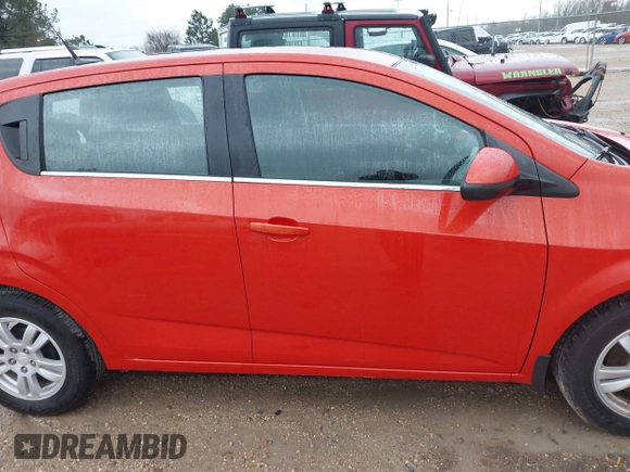 2013 Chevrolet Sonic LT with VIN 1G1JC6SHXD4139822, listed as a IAAI auction lot 41672289 with 87,899 mi miles. Bid and sale history available at carsss.com. Image 13.