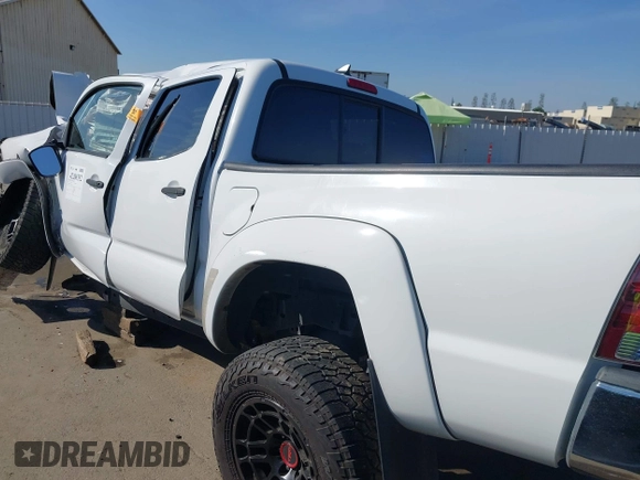 2012 Toyota Tacoma PreRunner z VIN 3TMJU4GN2CM128050, wystawiony jako IAAI lot #42200352 z przebiegiem Nie podano mil oraz . Historia ofert i sprzedaży dostępna na DreamBid. Obrazek 14.