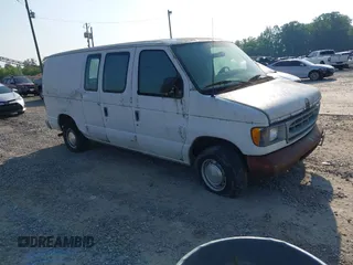 2001 Ford Econoline Cargo z VIN 1FTRE14261HA74987, wystawiony jako IAAI lot #42372331 z przebiegiem 75 465 mil mil oraz . Historia ofert i sprzedaży dostępna na DreamBid. Obrazek 1.