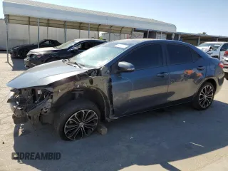 2014 Toyota Corolla L with VIN 5YFBURHE3EP106263, listed as a Copart auction lot 60925075 with 200,452 mi miles and Salvage title. Bid and sale history available at DreamBid. Image 1.