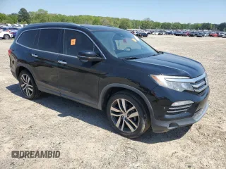 2018 Honda Pilot Touring with VIN 5FNYF6H93JB042446, listed as a Copart auction lot 52249195 with 111,044 mi miles and Salvage title. Bid and sale history available at DreamBid. Image 4.